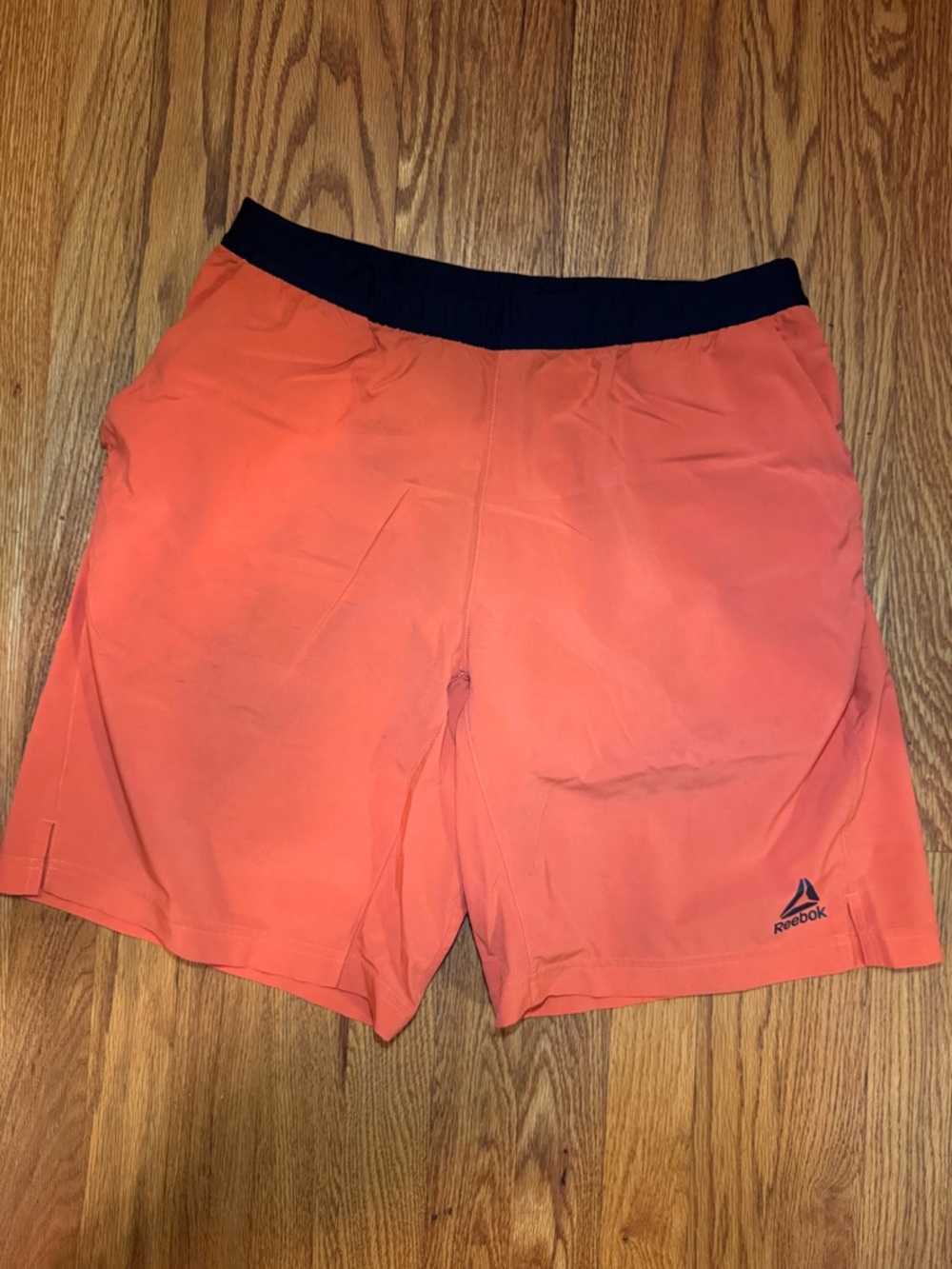 Reebok Men's Coral-Orange Athletic Shorts with Black Waistband